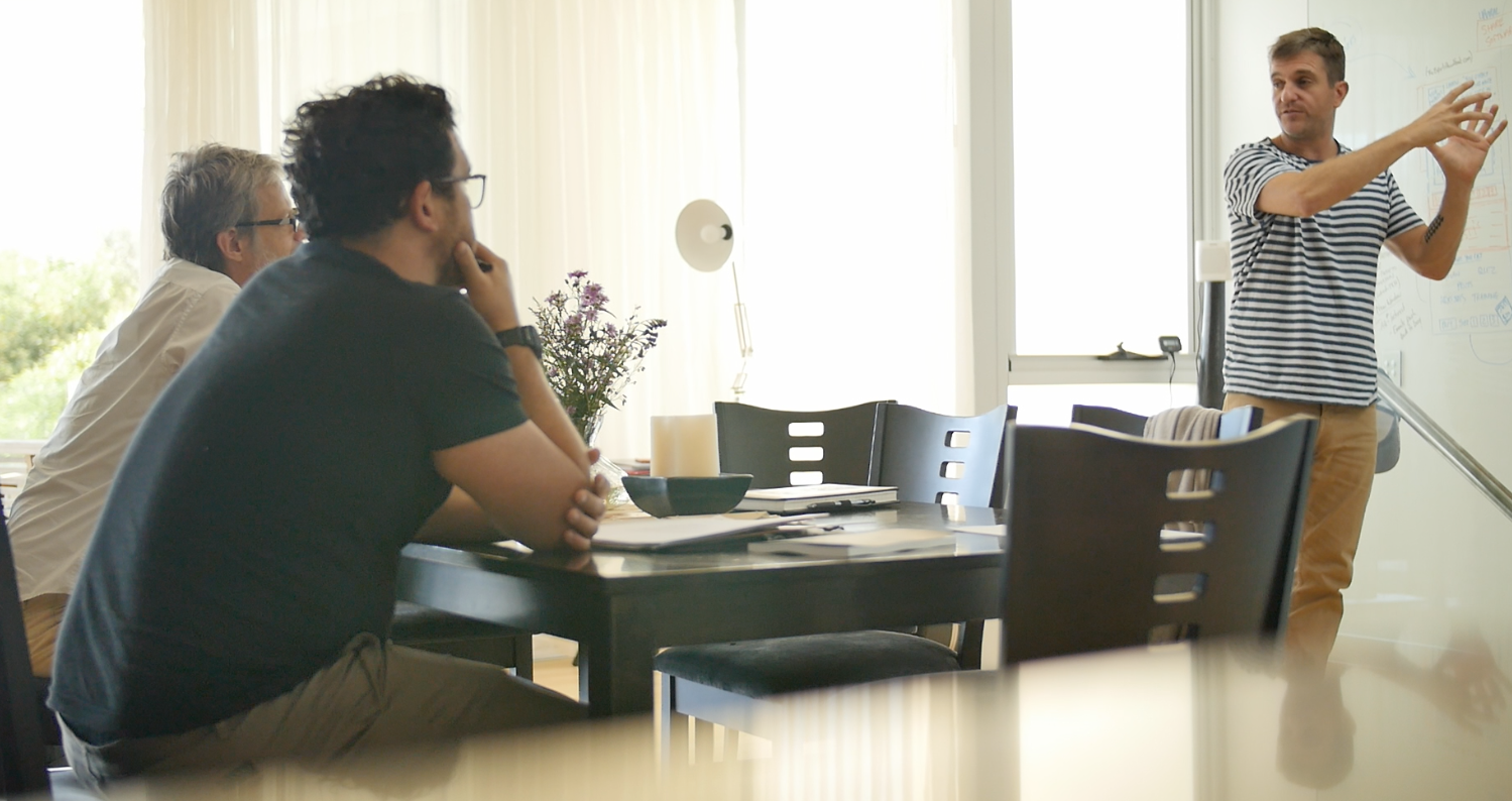 James Klobasa working with clients at the whiteboard